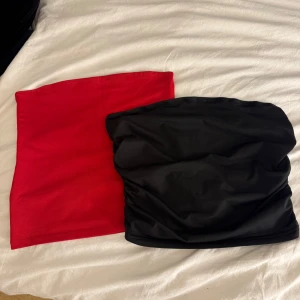 Två toppar i rött och svart - Säljer två toppar, en i rött och en i svart. S/XS