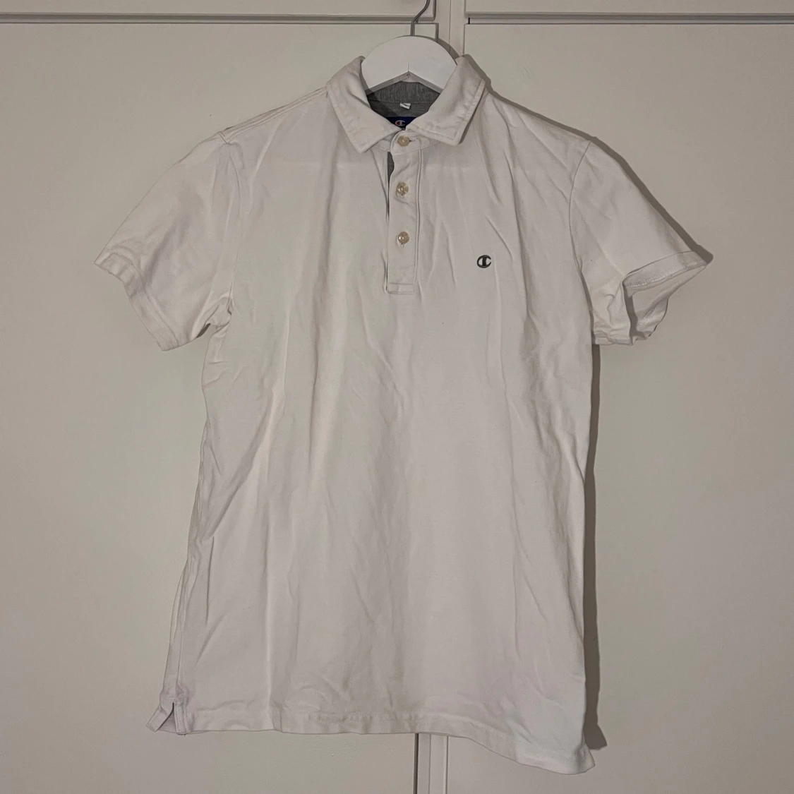 Vit pikétröja från Champion