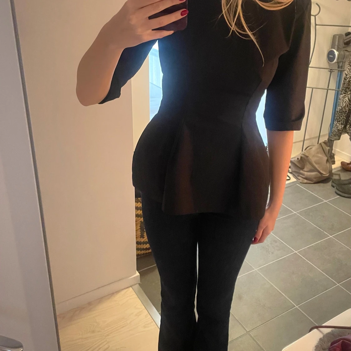 Svart peplumtopp med trekvartsärm - 1