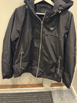 Prada black windbreaker jacket - size M, brand new with no flaws and stains or anything. Barely used, bought with item verification. Ask receipt DM