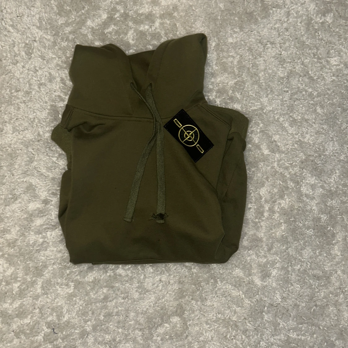 Olivgrön hoodie från Stone Island