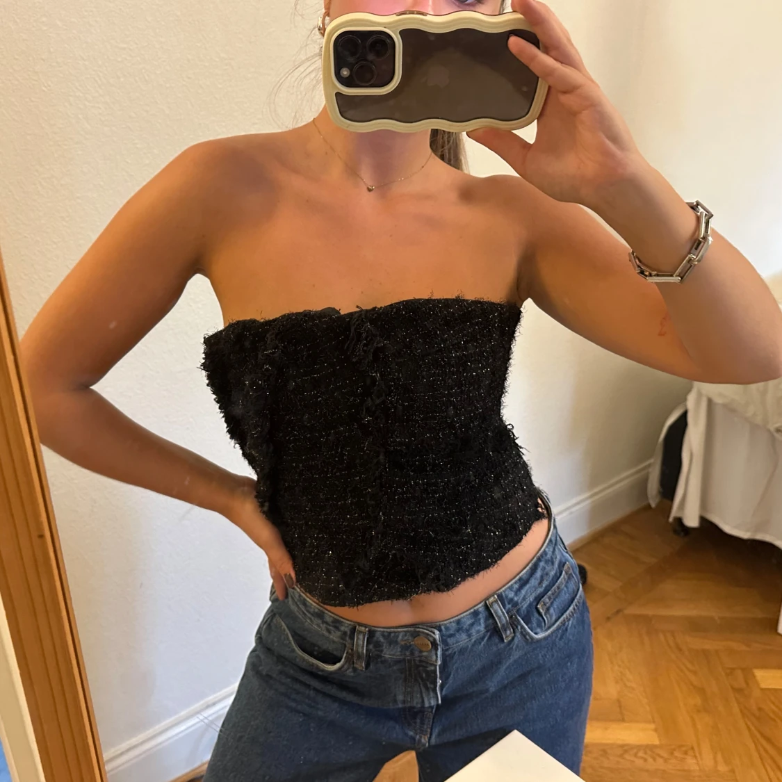 Svart glittrig tubtopp i bouclé - 1