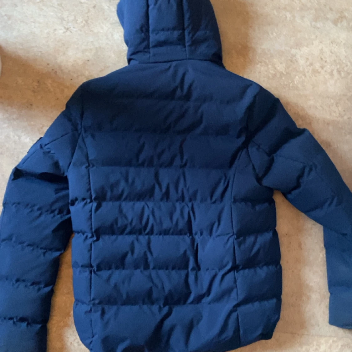 Blå pufferjacka från Crosshatch  - 1