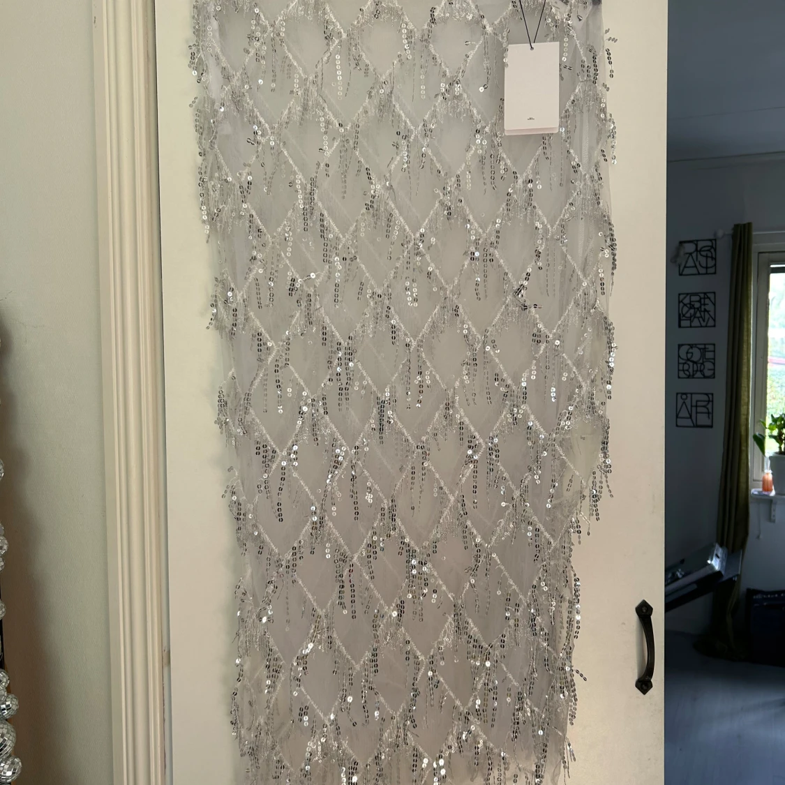 Glittrig silver kortklänning