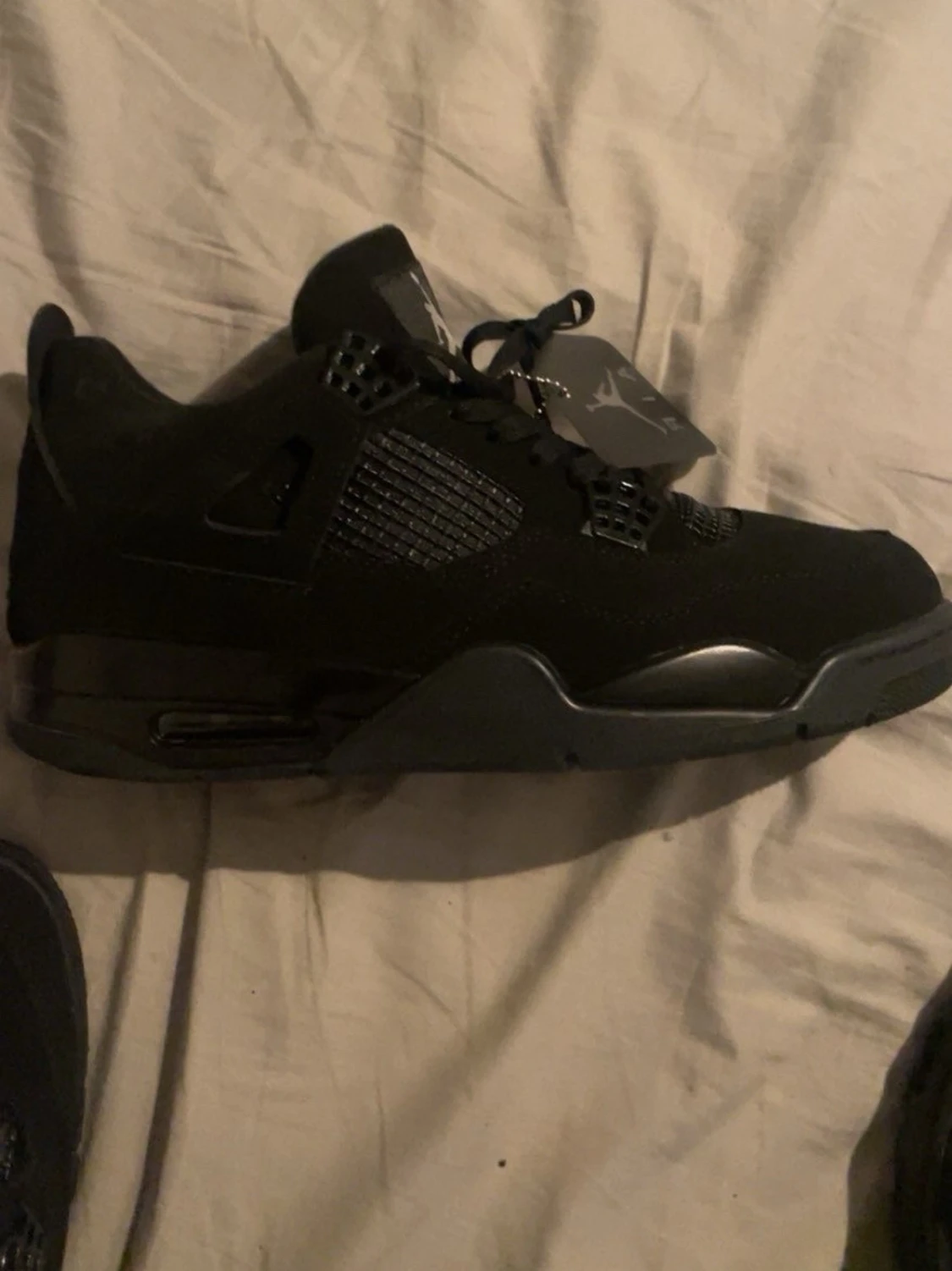 Svarta Nike Air Jordan 4 sneakers