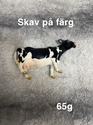 Ko från schleich - Lekt skick. Skav på färg