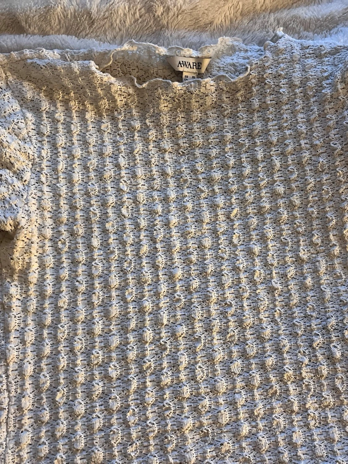 Vit ribbad topp från AWARE