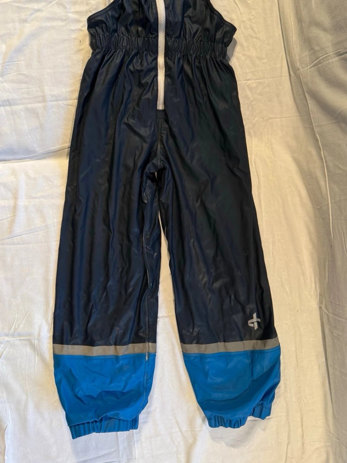 Blå och mörkblå täckbyxor och jacka  strl 130 - 1