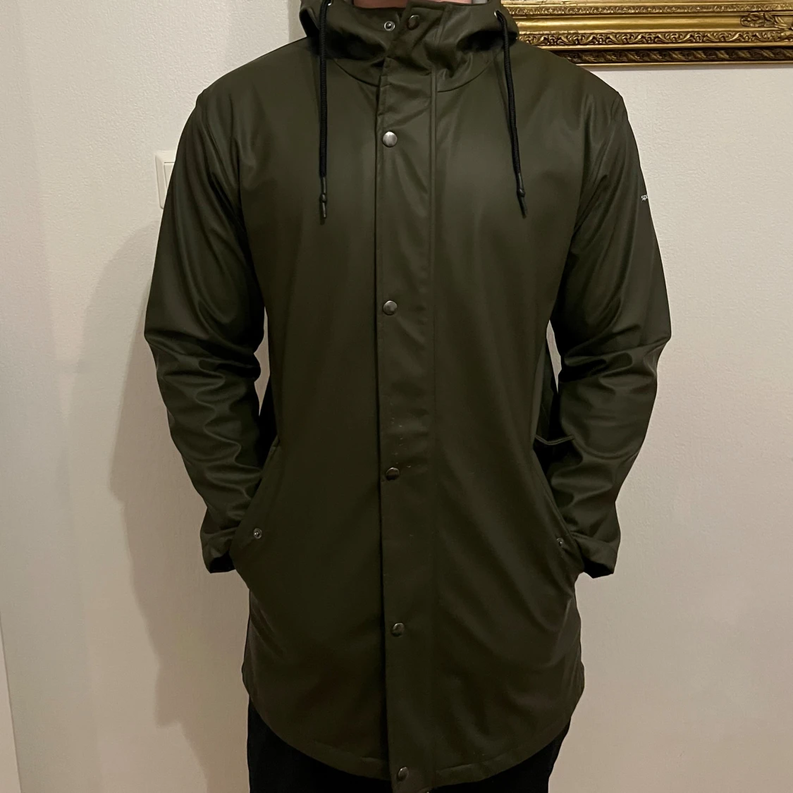 Olivgrön regnjacka från Cross Sportswear