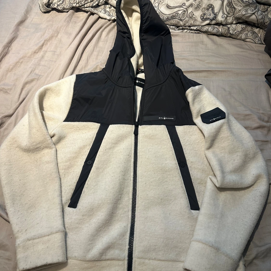 Vit och svart Sail Racing jacka L