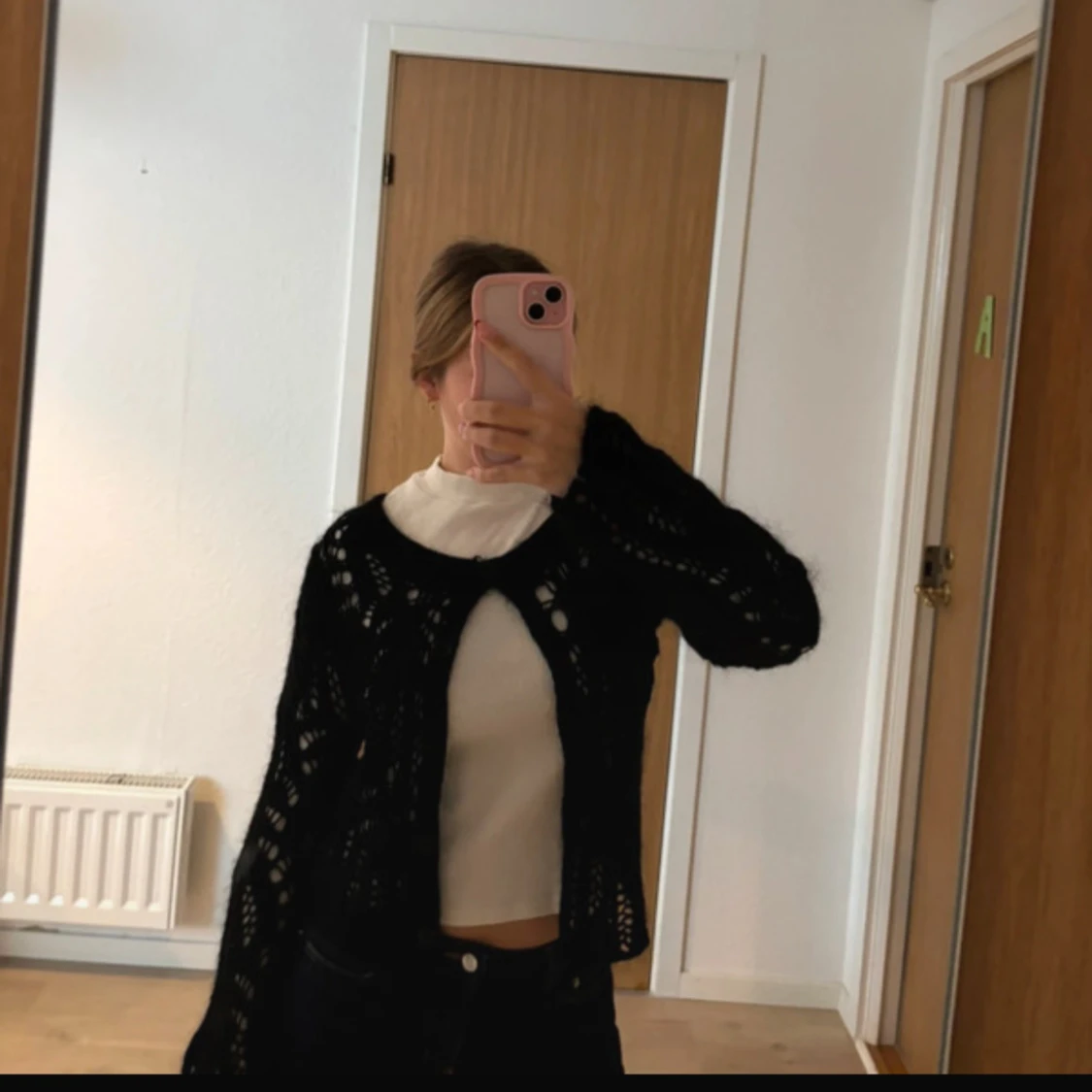 Svart stickad kofta från Jinska