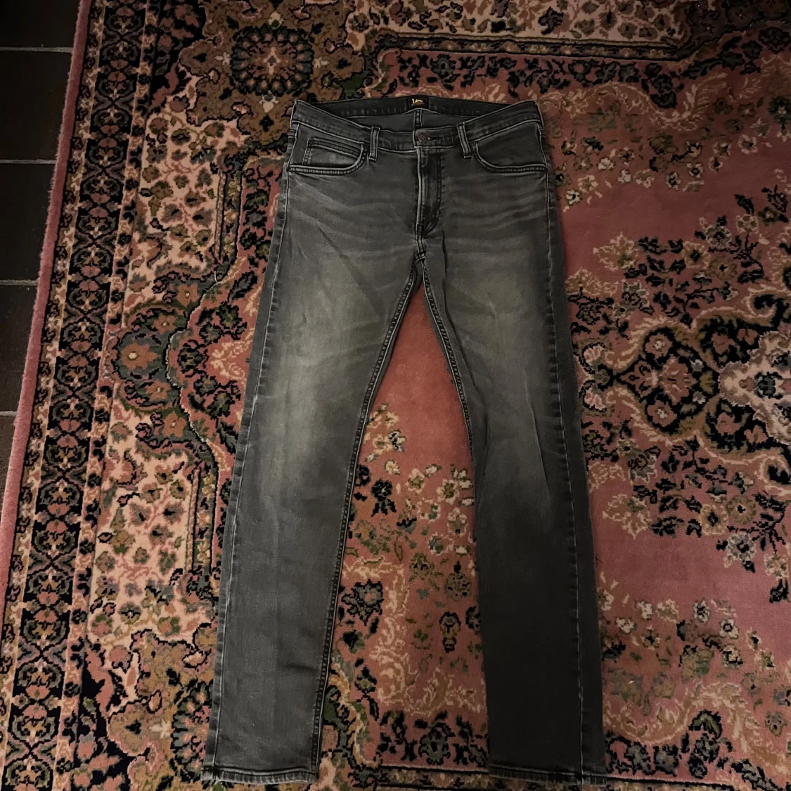 Grå slim jeans från Lee 31/32