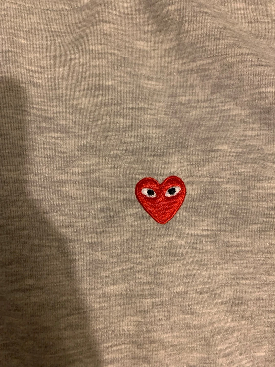 Grå hoodie från Comme des Garçons Play - 1