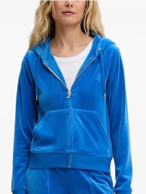 Blå zip hoodie från Juicy Couture - Snygg blå hoodie i mjuk velour från Juicy Couture. Dragkedja framtill, två fickor och justerbar huva med snören. Ikonisk JC-logga broderad på bröstet. Perfekt för en chill och trendig look.