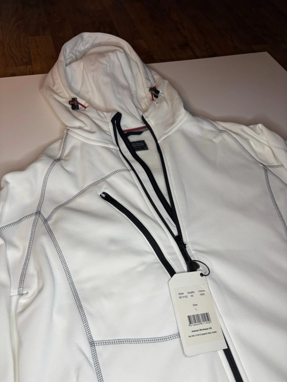 Vit vindjacka med huva från Jobman - 2