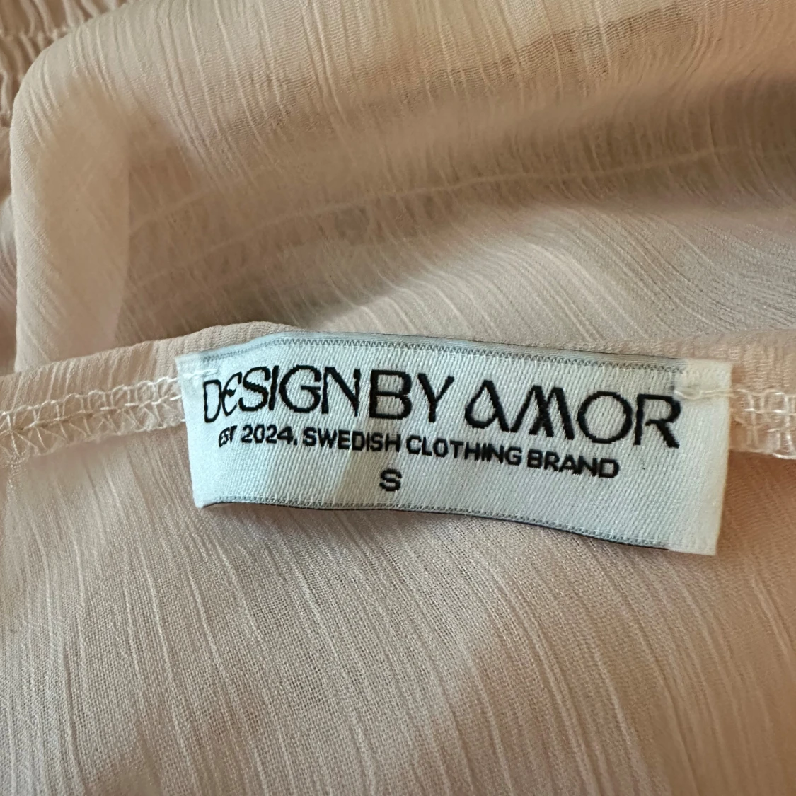 Ljusrosa kortklänning från Design By Amor - 1