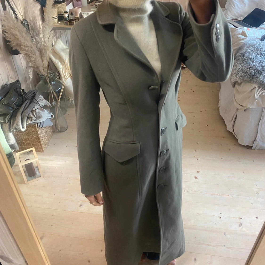 Grön figursydd ullkappa