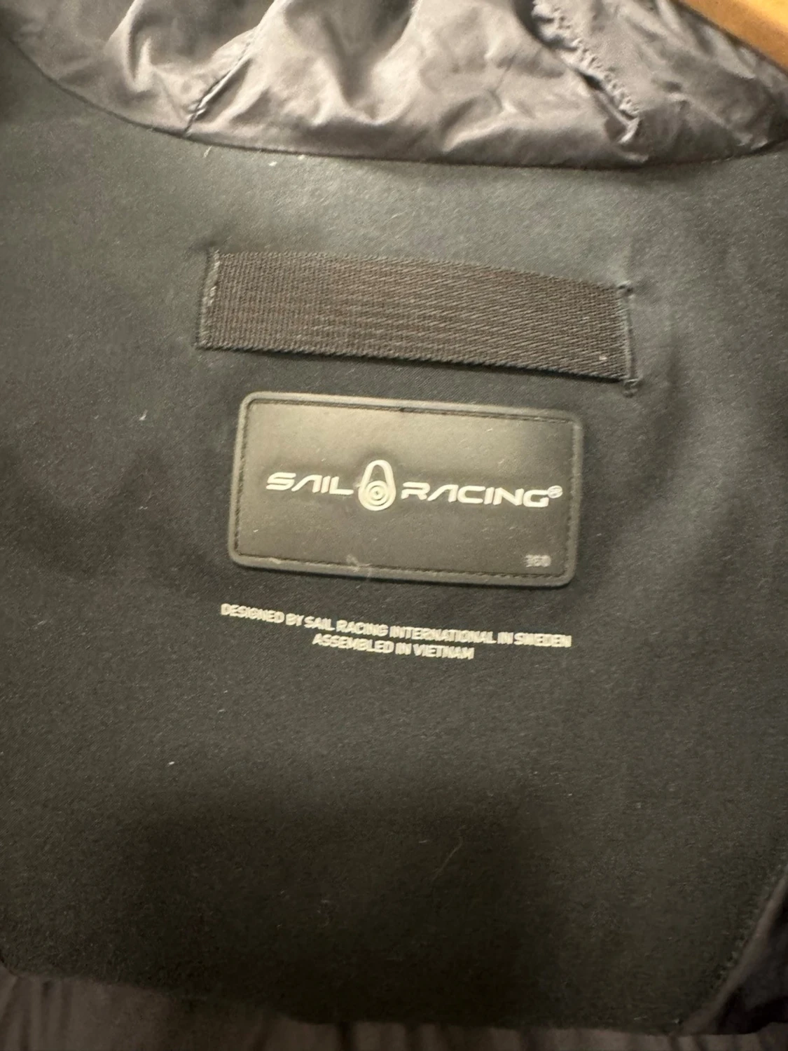 Svart dunjacka från Sail Racing - 2