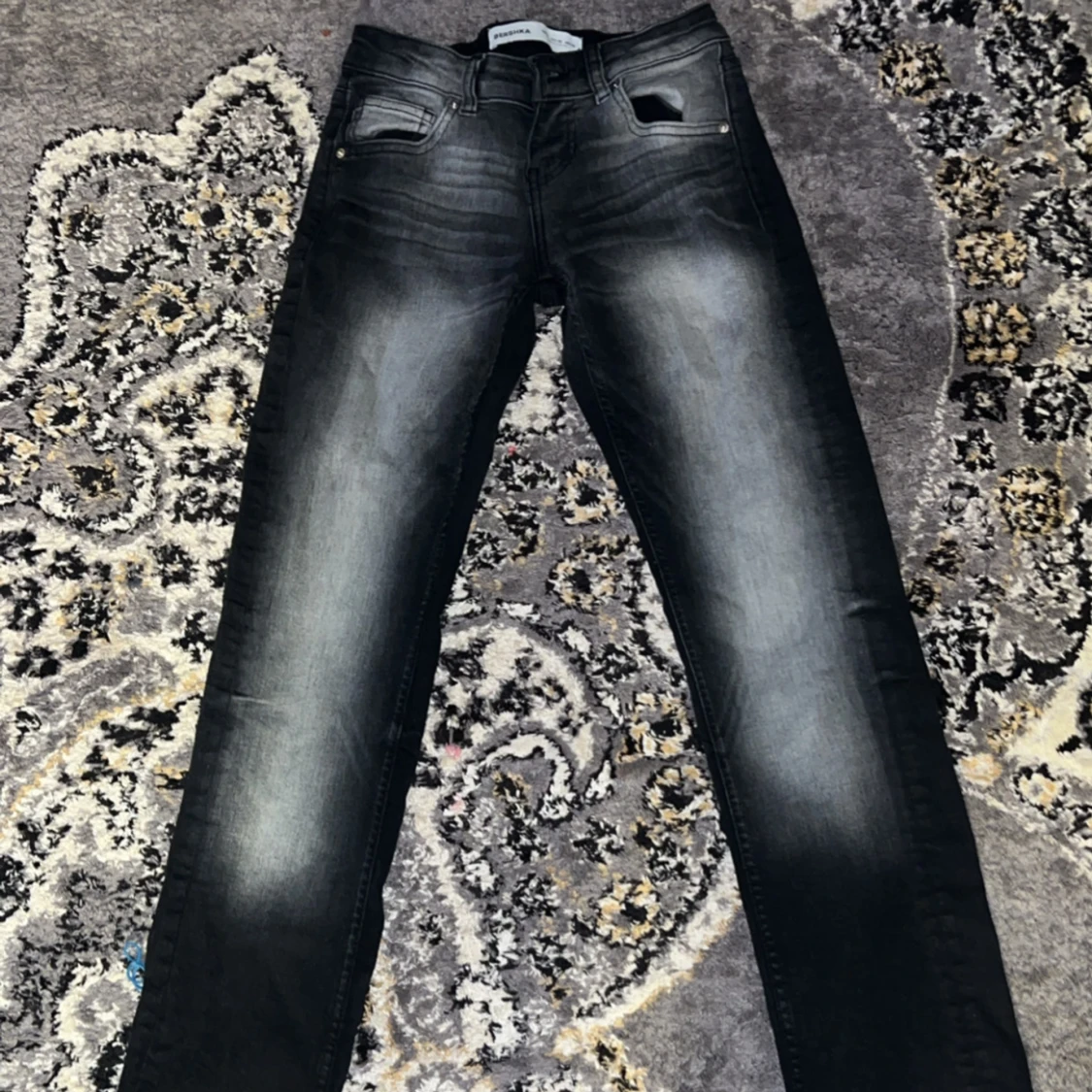 Svarta lågmidjade jeans 