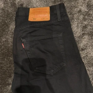 Svarta Levi's 501 jeans W29 L32 - Svarta Levi's 501 jeans med klassisk rak passform