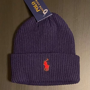 Ralph Lauren Mössa Ny med tagg - Skriv vid frågor eller funderingar. Pris går diskutera vid snabb affär.