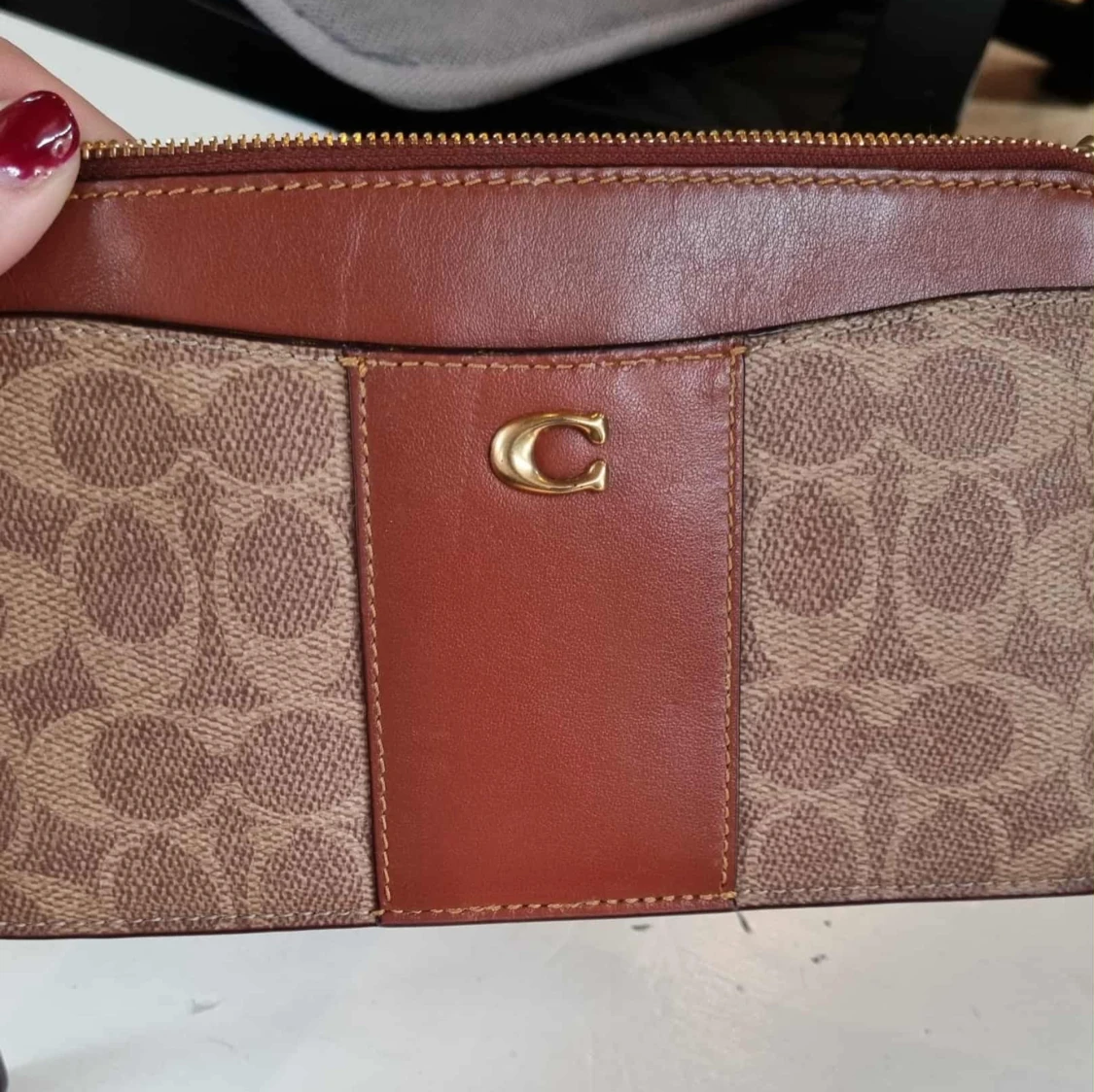 Brun plånbok från Coach i skinn