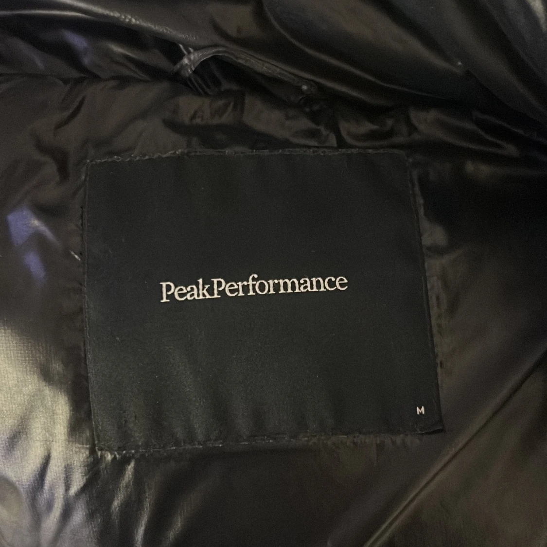 Svart dunväst Peak Performance M - 1