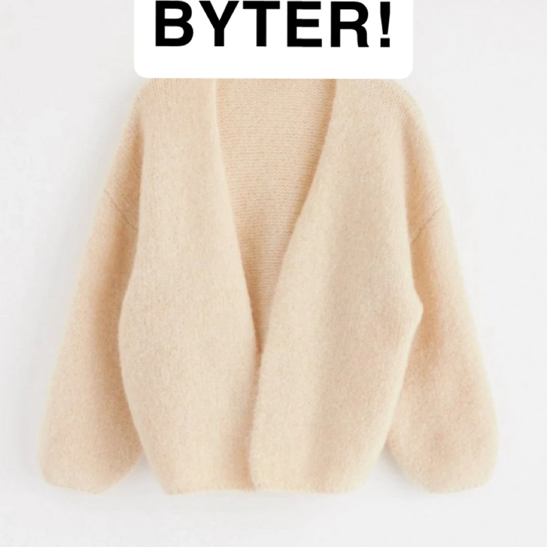 Vit/krämfärgad kofta från Lindex