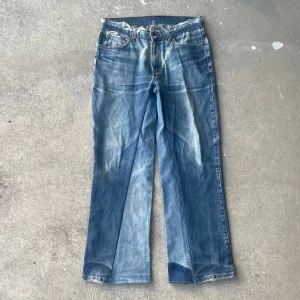 Reworked vintage jeans - Waist 43cm, length 106cm, leg opening 26cm. 