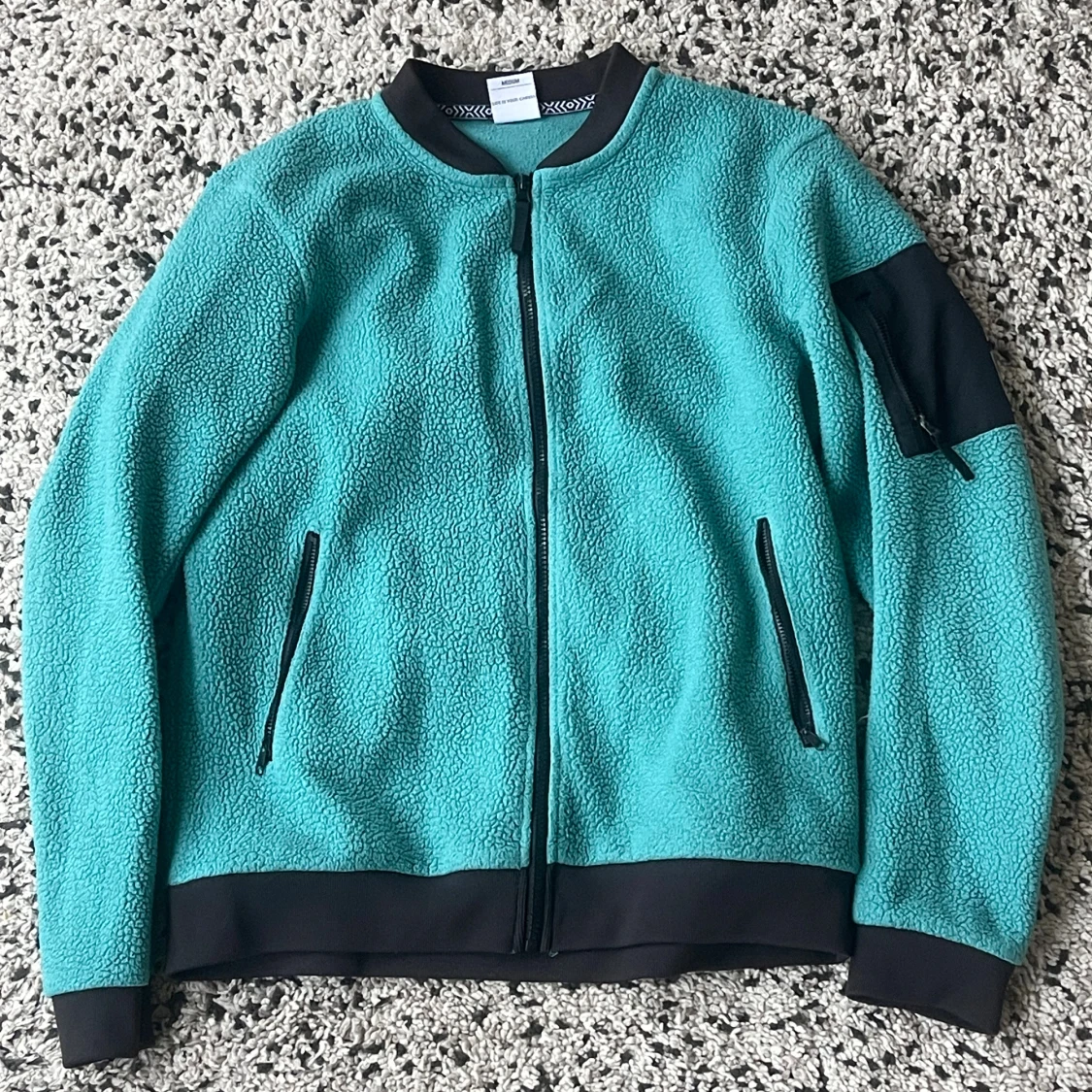 Turkos fleecejacka från Wear Colour