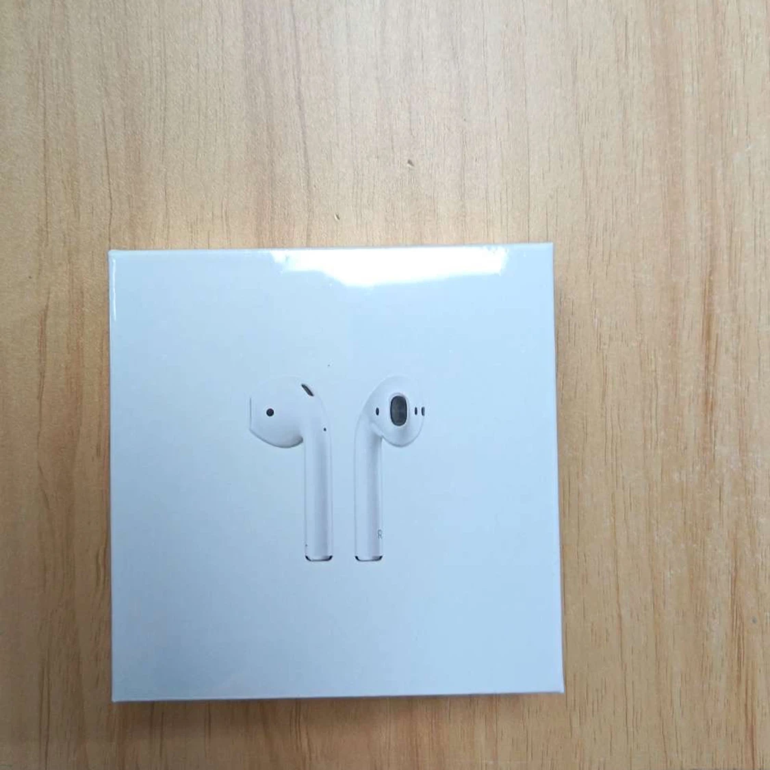 AirPods med trådlöst laddningsetui