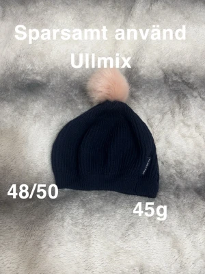 Polarn o pyret mössa - Ullmix ( 50% merinoull). Sparsamt använd. Storlek 48/50