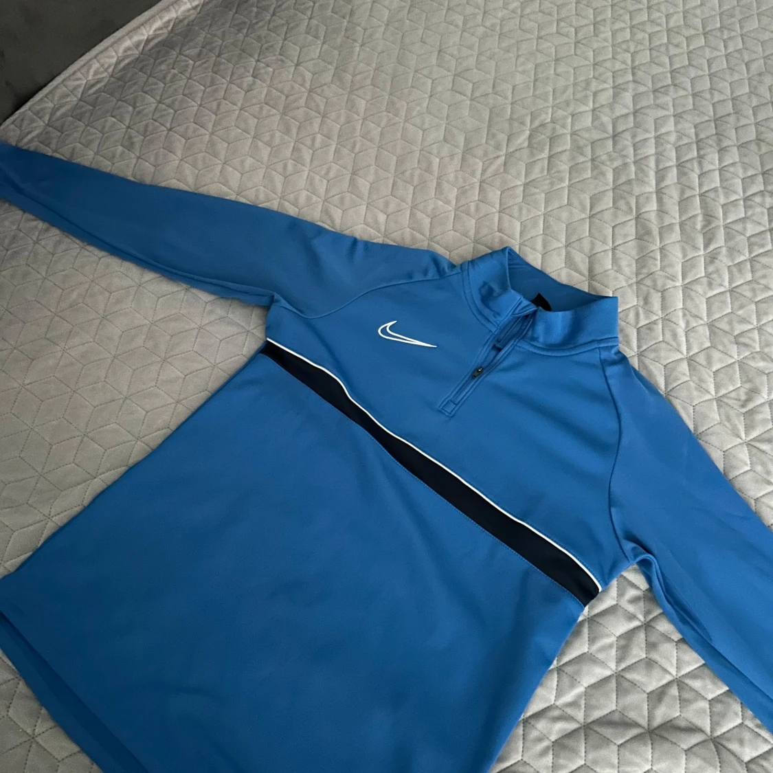 Blå Nike Dri-Fit half zip tröja