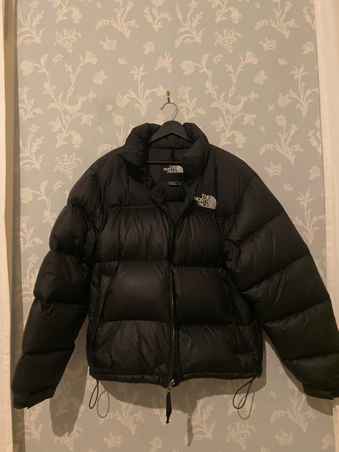 Svart dunjacka från The North Face M