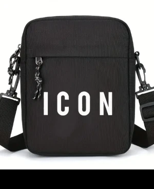 Svart axelväska ICON med dragkedja - Svart axelväska från ICON med vit text framtill. Väskan har justerbar axelrem, dragkedja upptill och extra dragkedjeficka på framsidan. Tillverkad i slitstark polyester och har snygga repdetaljer på dragkedjorna. Perfekt storlek för mobil och småprylar.