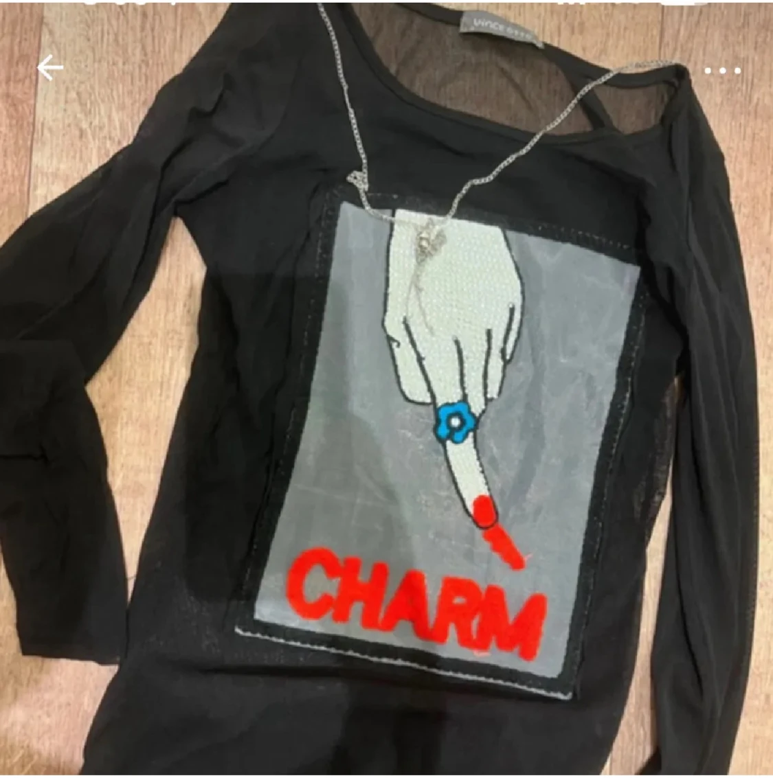 Svart meshtröja med print från Unice