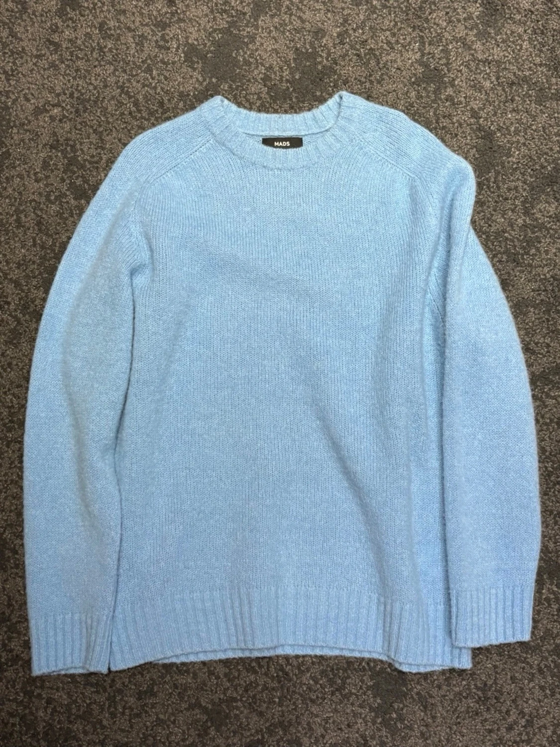 Ljusblå stickad tröja från Mads Nørgaard