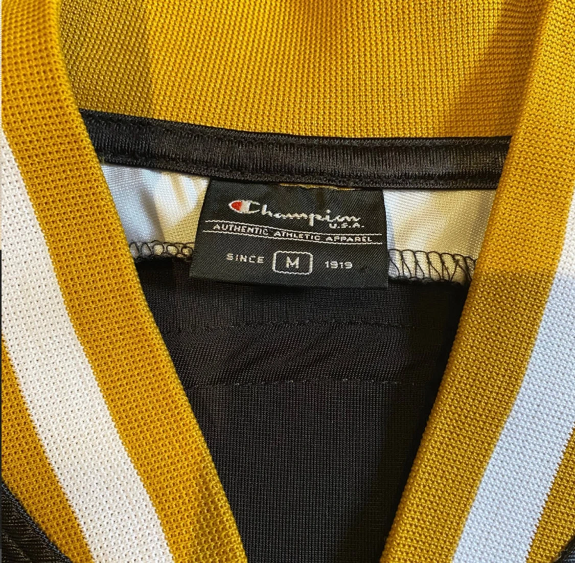 Champion NBA pikétröja svart/gul M - 1