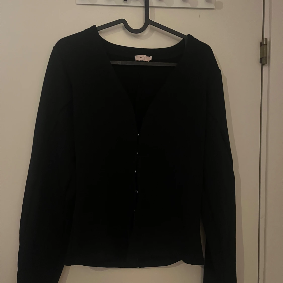 Svart kofta från Nelly med knappar - 1