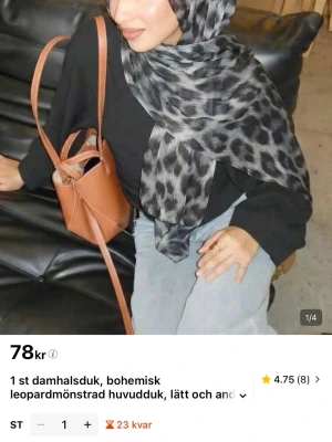 Leopardmönstrad sjal i svart och grått - Snygg sjal med leopardmönster i svart och grå toner. Jag råkade tyvärr beställa 2 så säljer en nu