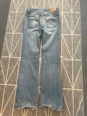 nudie jeans bootcut eddy vintage  - Ett par vintage nudies modellen bootcut eddy! tillverkas inte längre så är ett eftersett modell. W28/32. Mått kan fixas. Skickas inom 24 timmar