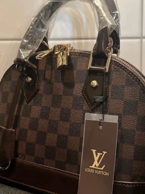 Snygg handväska  - Snygg handväska väldigt snyggt och unikt 