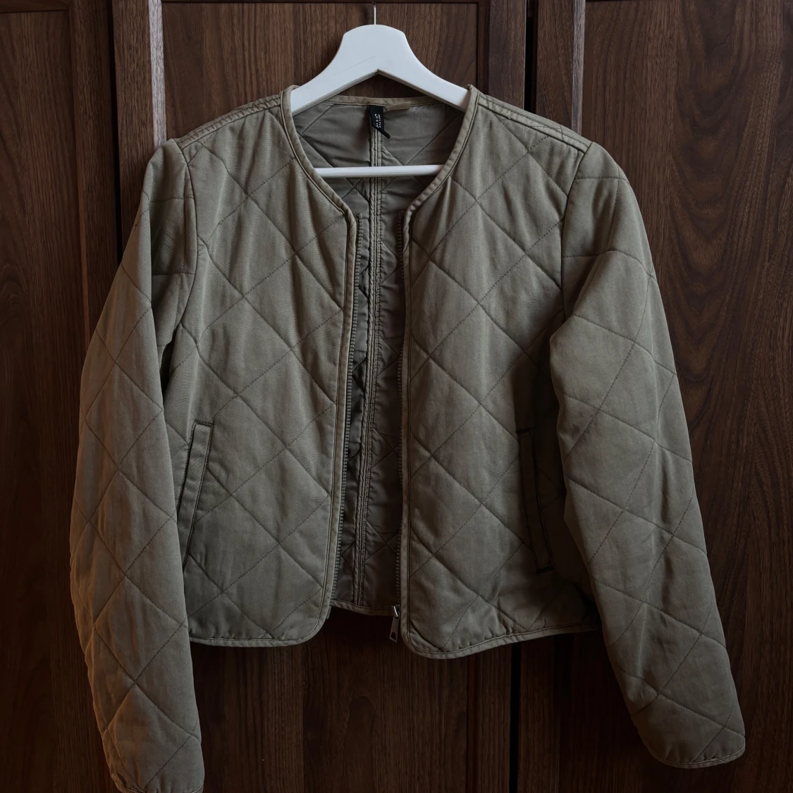 Grön quiltad jacka från H&M