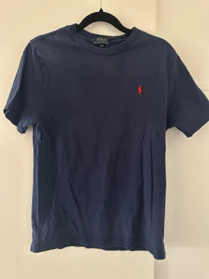 T-shirt Polo Ralph Lauren  - En tshirt från Polo Ralp Lauren, Barnstorlek L (14-16y)