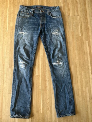 Nudie jeans - Säljer ett par riktigt feta jeans från Nudie jeans. Modellen är Grim Tim. Storlek: W30 L32