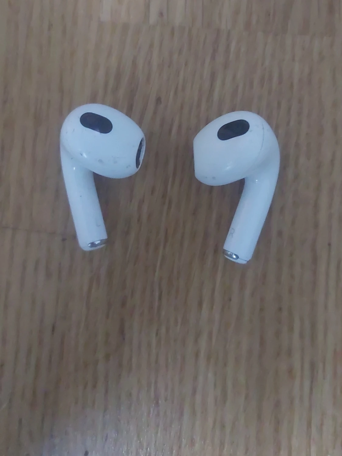 Trådlösa vita in-ear hörlurar
