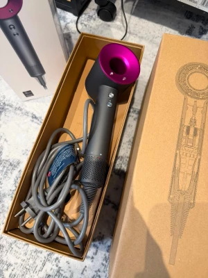 Dyson hairdryer - Its just like new, with no signs of use! Feel free to ask me questions. We buy and sell original only ❤️🥰