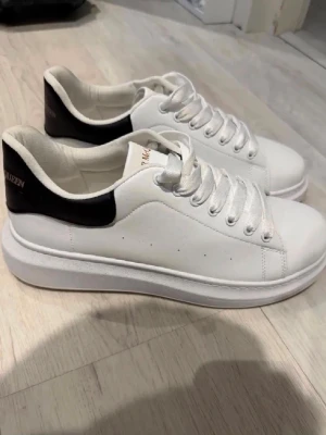 Alexander Mcqueen white shoes - A bit used, in good condition. Ask DM for more questions and follow insta to join our giveaways!