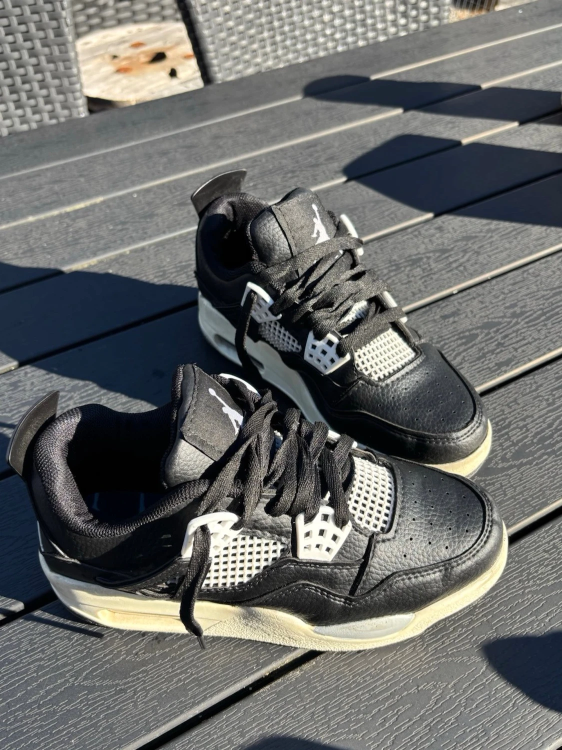 Svarta Air Jordan 4 sneakers