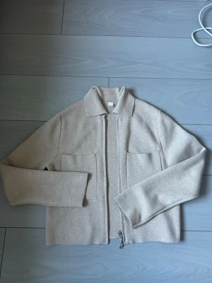 cardigan with a zipper - very pretty. we can talk about price 